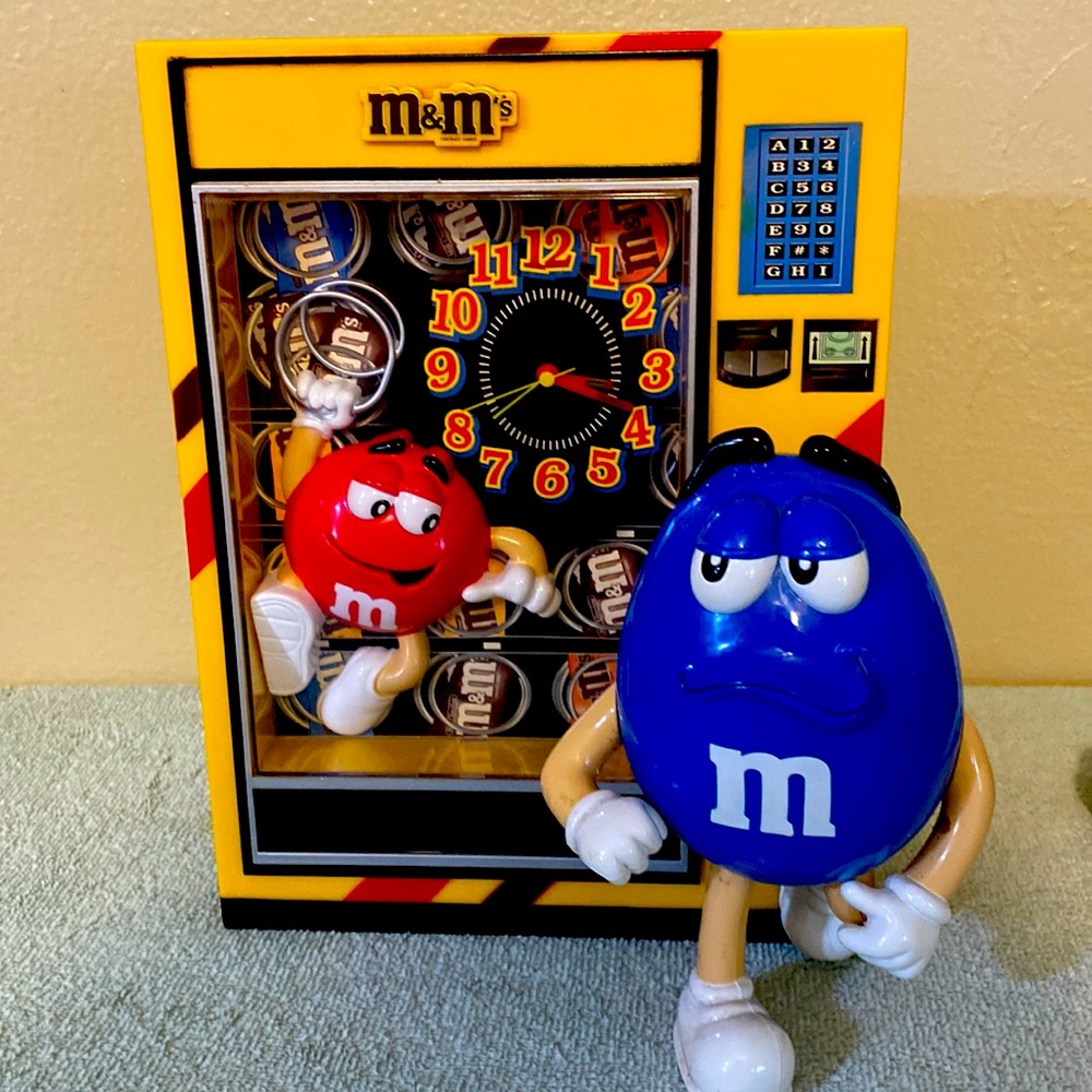 M&M combination alarm clock and bank
